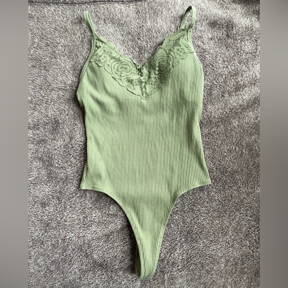 PINK thong body suit. - Picture 1 of 5